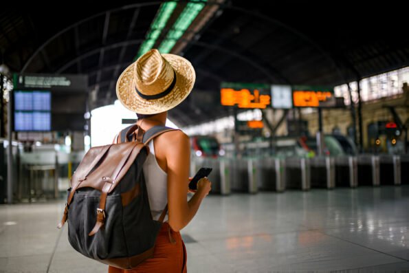 Woman with a travel backpack at the Airport